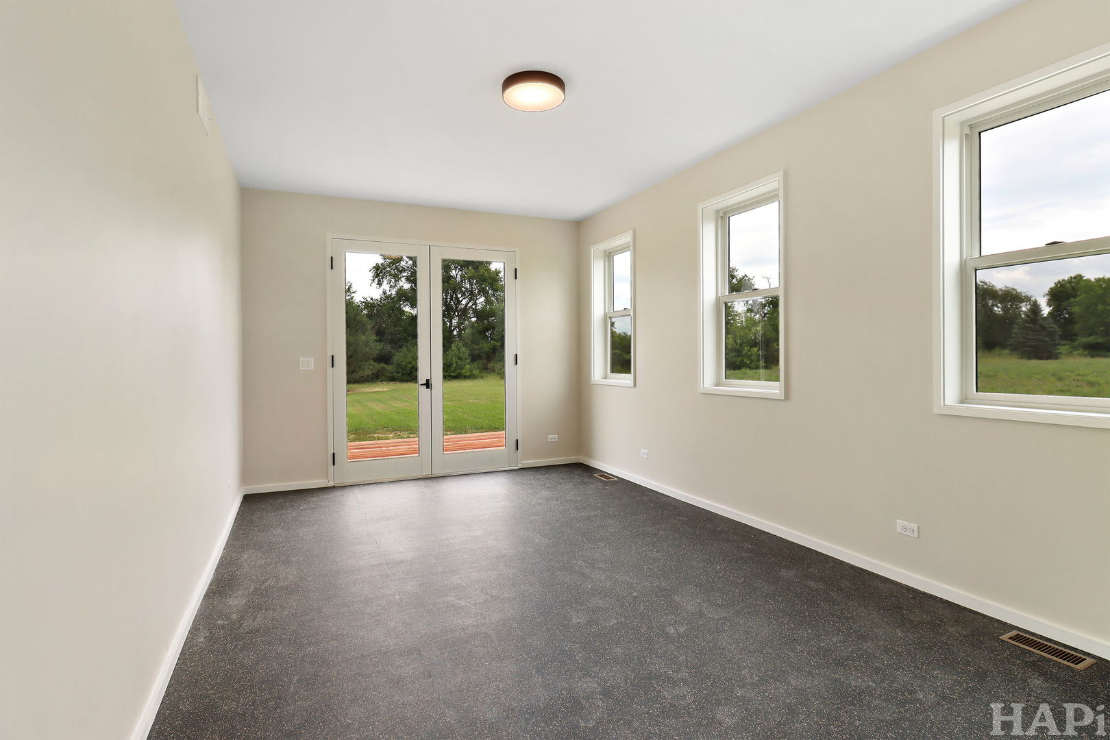 7304 Briar Drive Spring Grove, IL 60081 - Photo 18 of 50 an empty room with windows