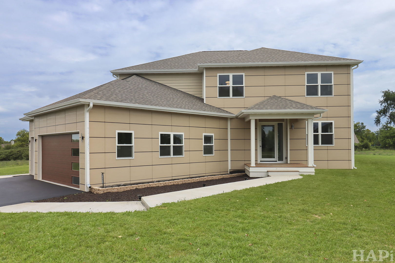 7304 Briar Drive Spring Grove, IL 60081 - Photo 2 of 50 a view of a house with a yard