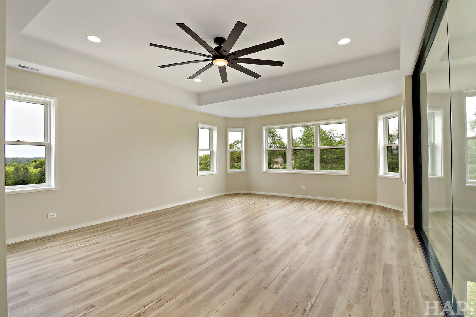 7304 Briar Drive Spring Grove, IL 60081 - Photo 29 of 50 a view of an empty room with wooden floor and a window