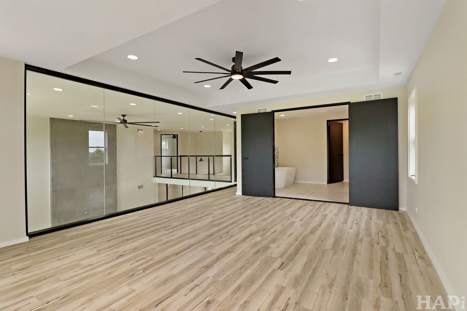 7304 Briar Drive Spring Grove, IL 60081 - Photo 30 of 50 a view of empty room with wooden floor and fan