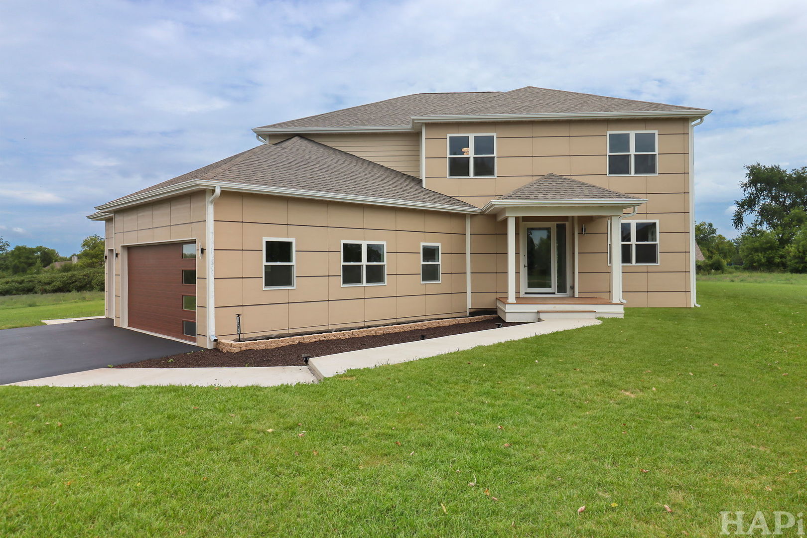 7304 Briar Drive Spring Grove, IL 60081 - Photo 3 of 50 a view of a back yard of the house