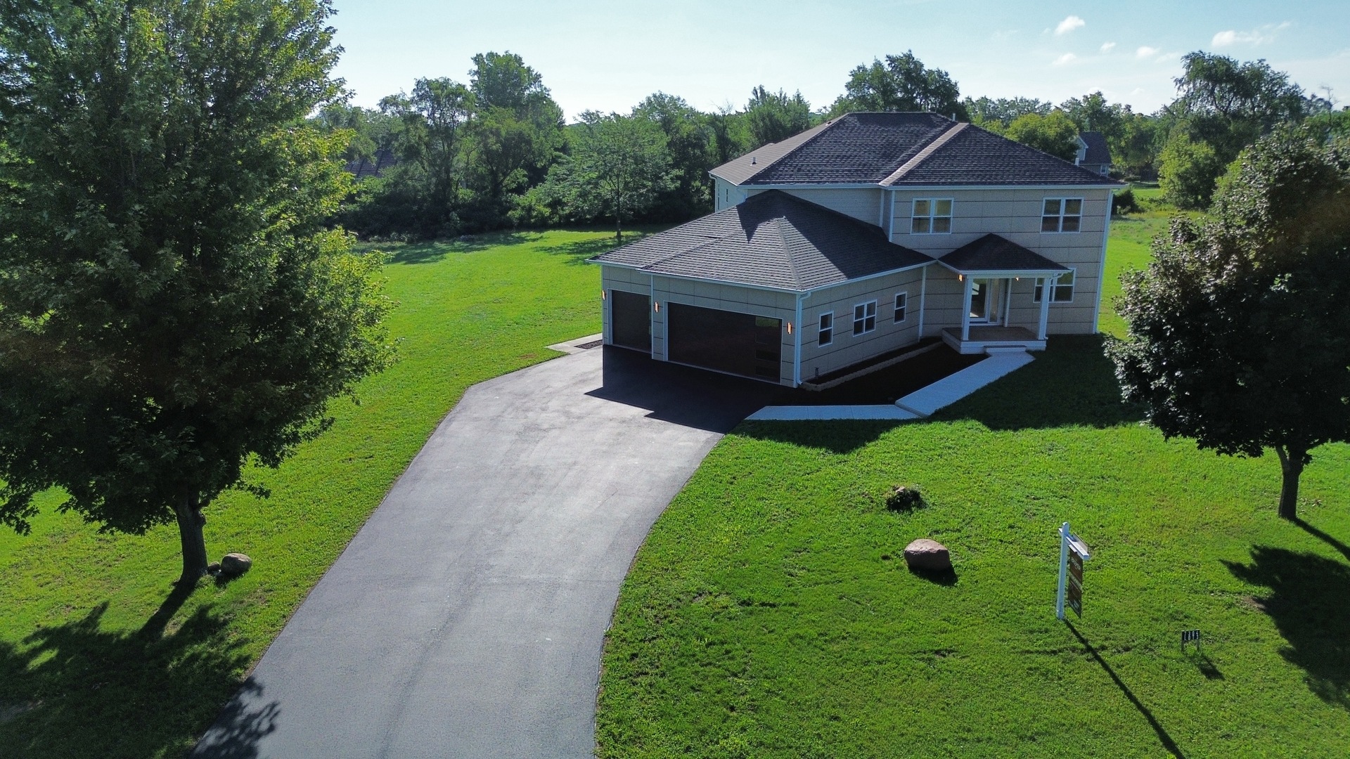 7304 Briar Drive Spring Grove, IL 60081 - Photo 41 of 50 a aerial view of a house with a big yard