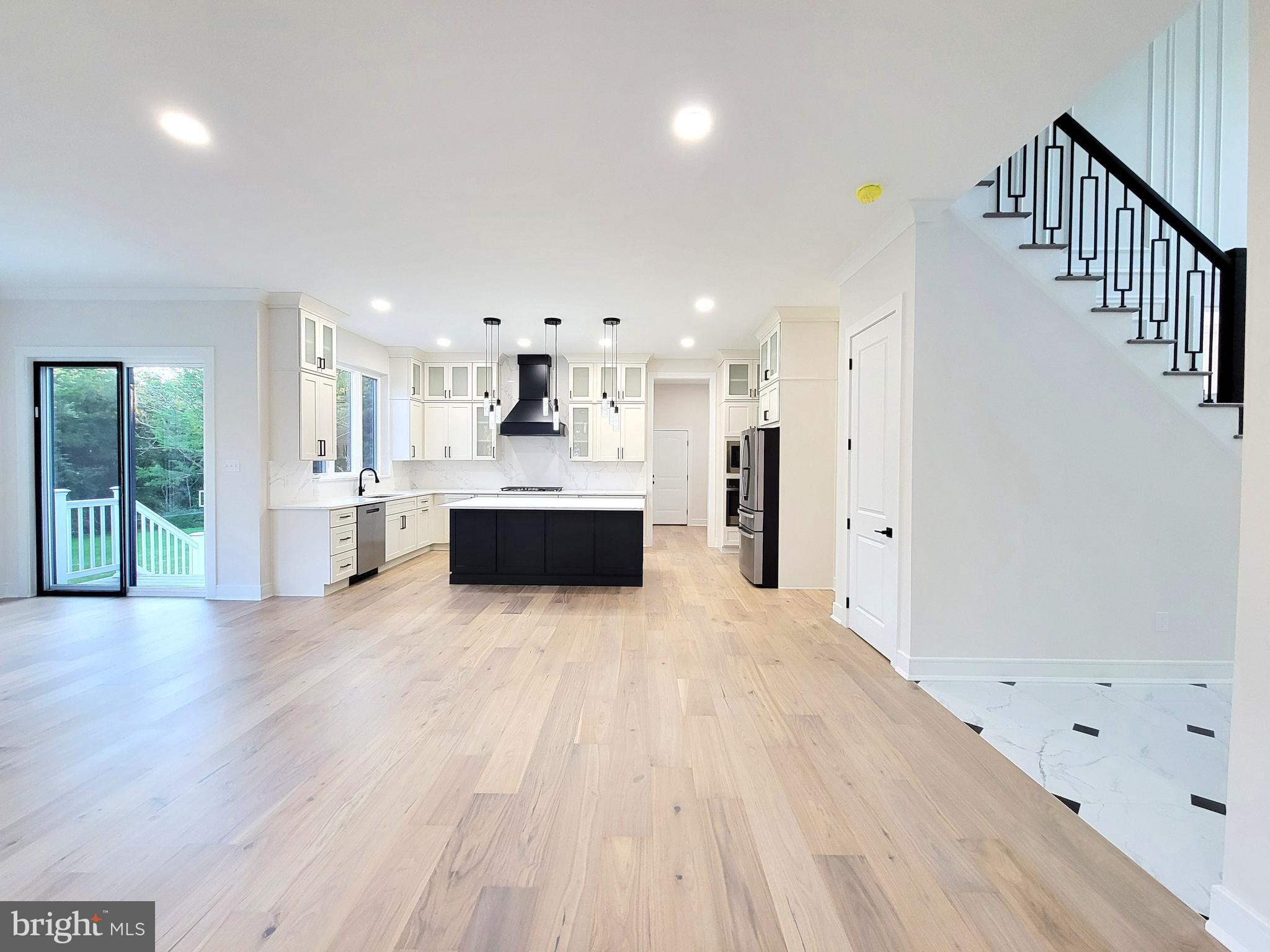 4517 Ascher Road Vineland, NJ 08361 - Photo 30 of 52 a view of a kitchen with furniture and wooden floor