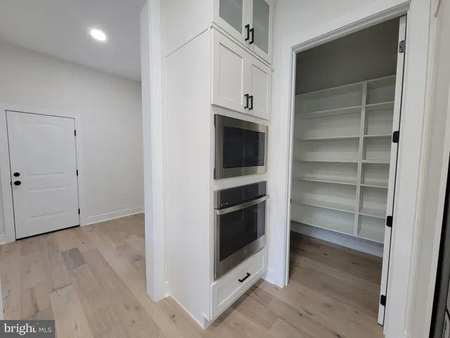 a view of an empty walk in closet