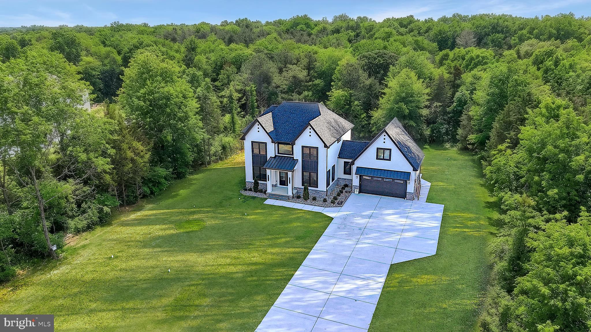 4517 Ascher Road Vineland, NJ 08361 - Photo 4 of 52 a aerial view of a house next to a big yard