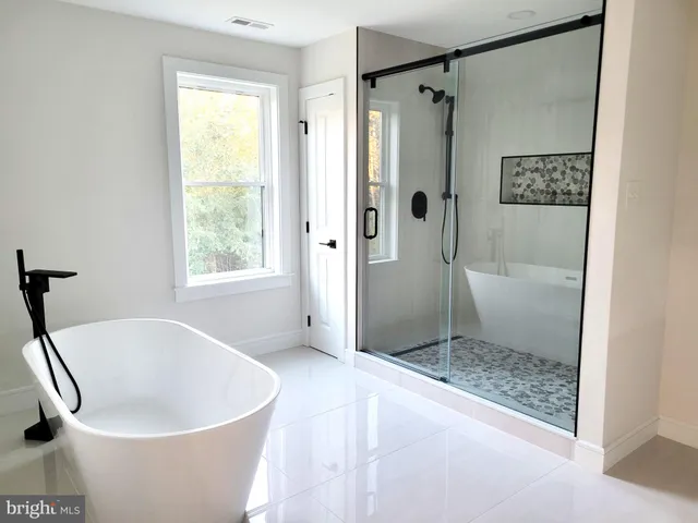 a view of a bathtub in a bathroom