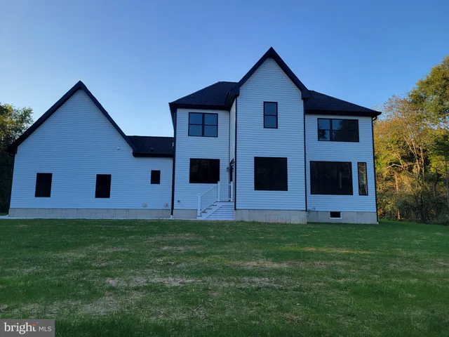 a front view of house with yard