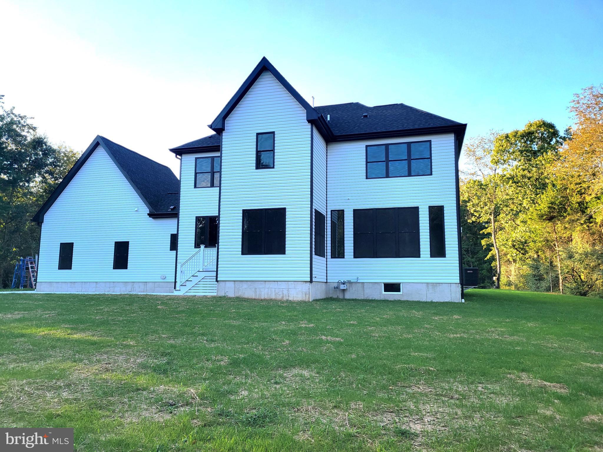 4517 Ascher Road Vineland, NJ 08361 - Photo 10 of 52 a view of front of house with a yard