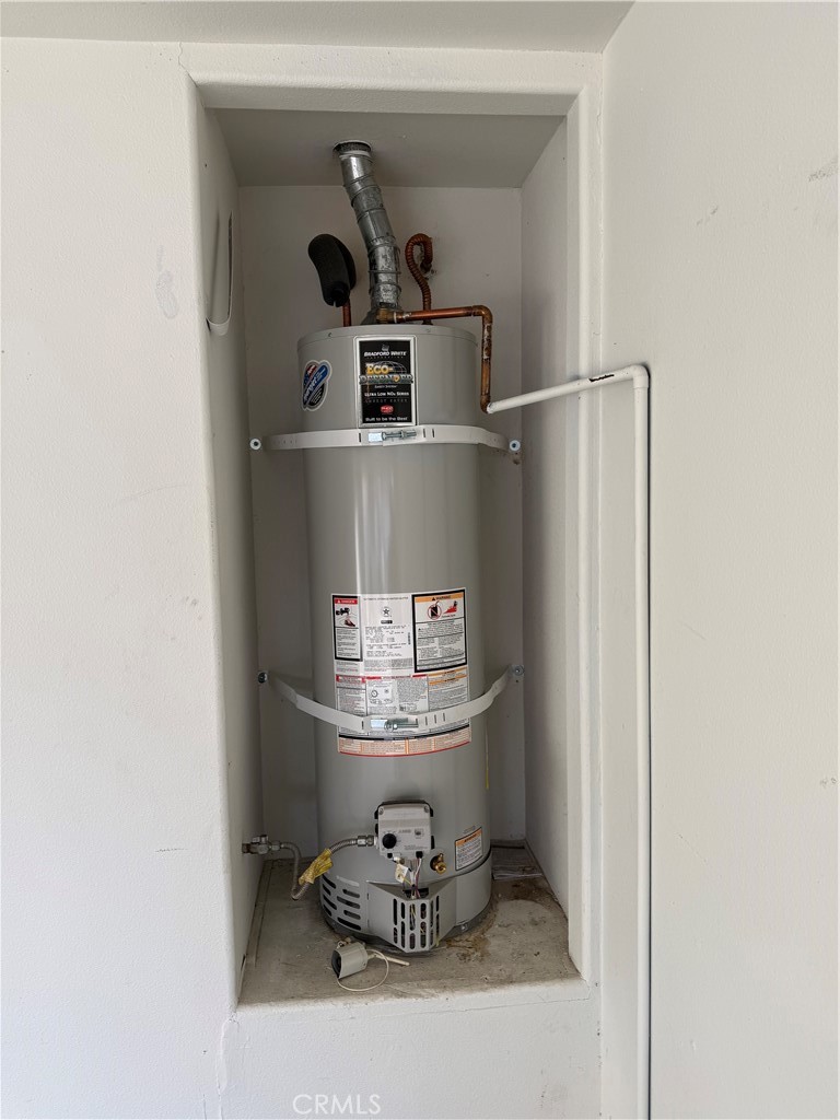 372 Via Capri Hemet, CA 92545 - Photo 23 of 27 a water heater and a refrigerator