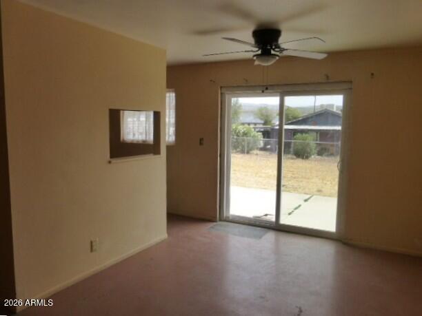 303 Greenwich Road Kearny, AZ 85137 - Photo 16 of 18 an empty room with a window