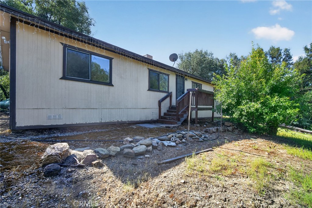 3804 Owl Creek Road Mariposa, CA 95338 - Photo 1 of 18 a backyard of a house with lots of green space