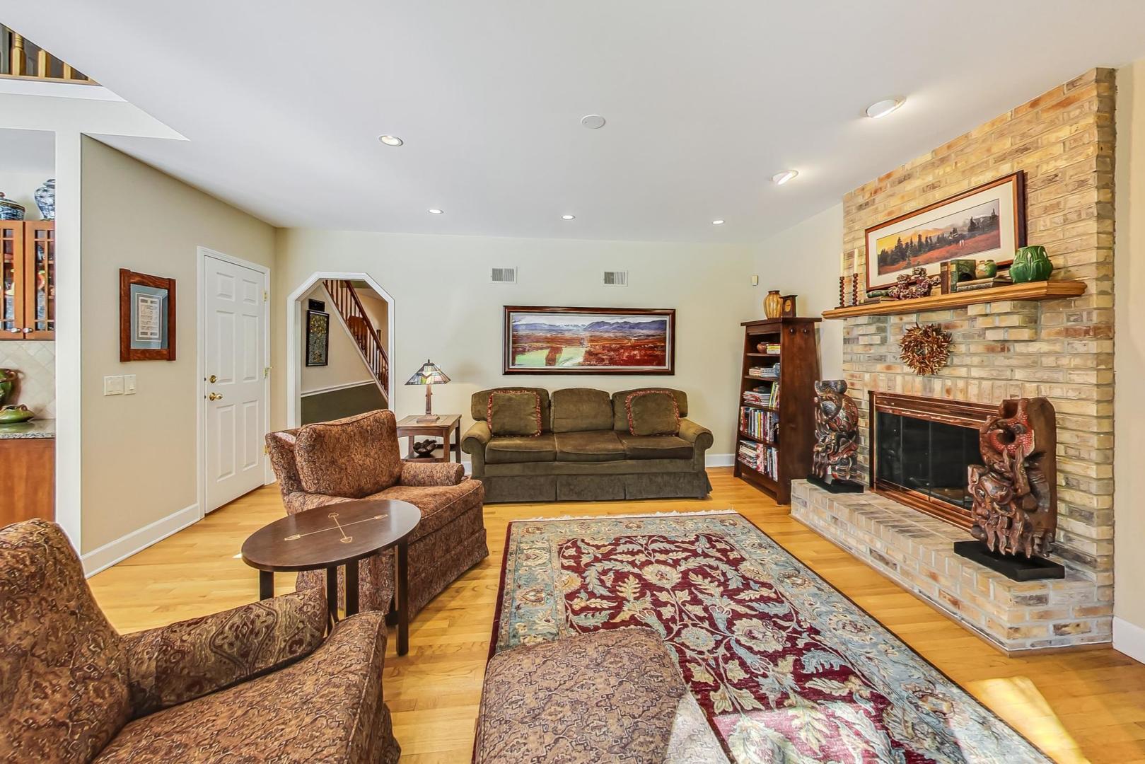 4763 Middle Road Gurnee, IL 60031 - Photo 14 of 47 a living room with furniture and a fireplace