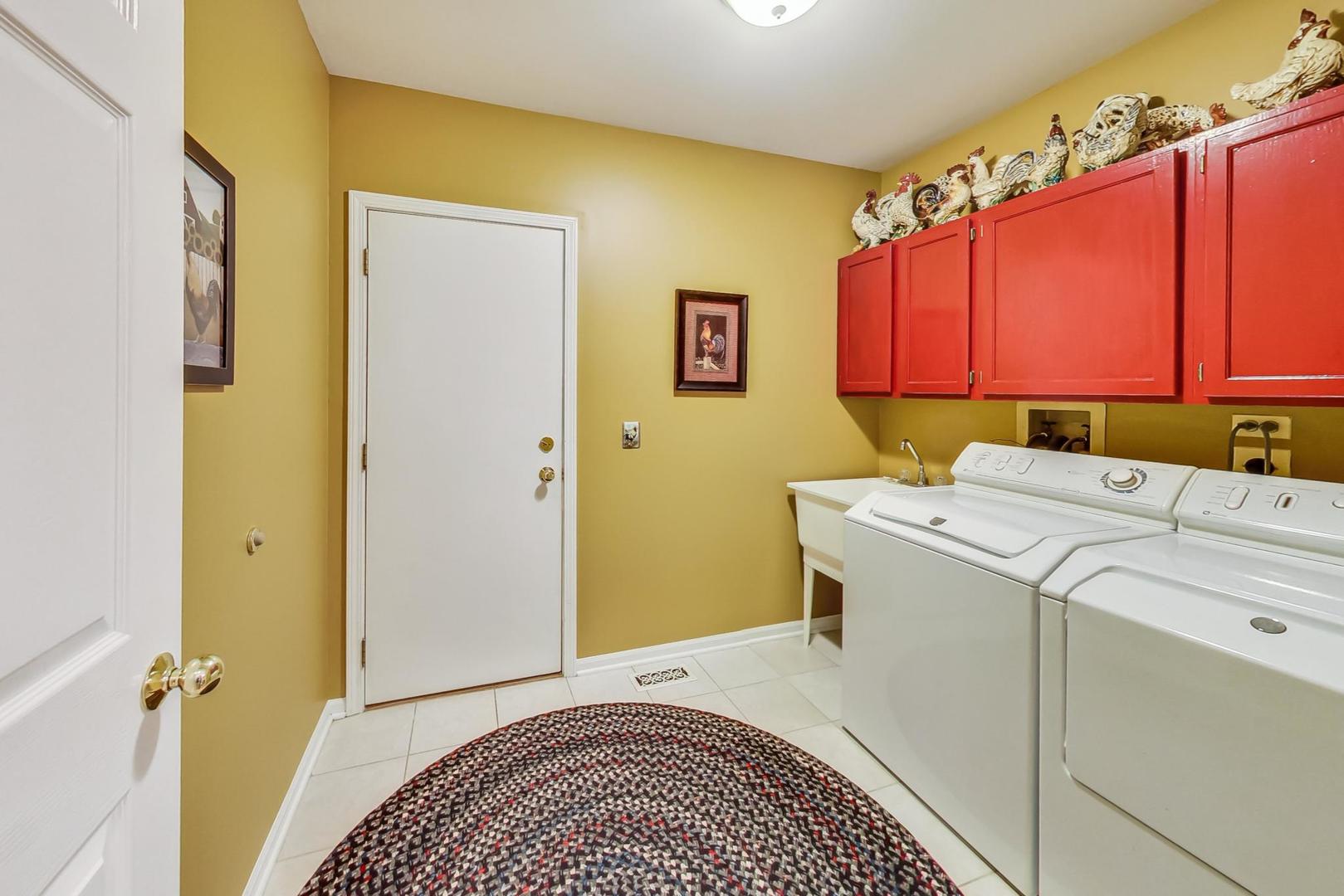 4763 Middle Road Gurnee, IL 60031 - Photo 17 of 47 a utility room with dryer and washer