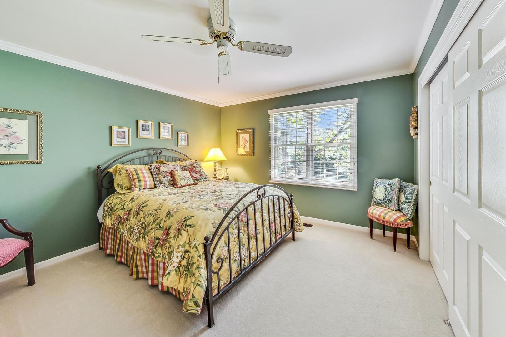 4763 Middle Road Gurnee, IL 60031 - Photo 24 of 47 a bedroom with a bed chair and a window
