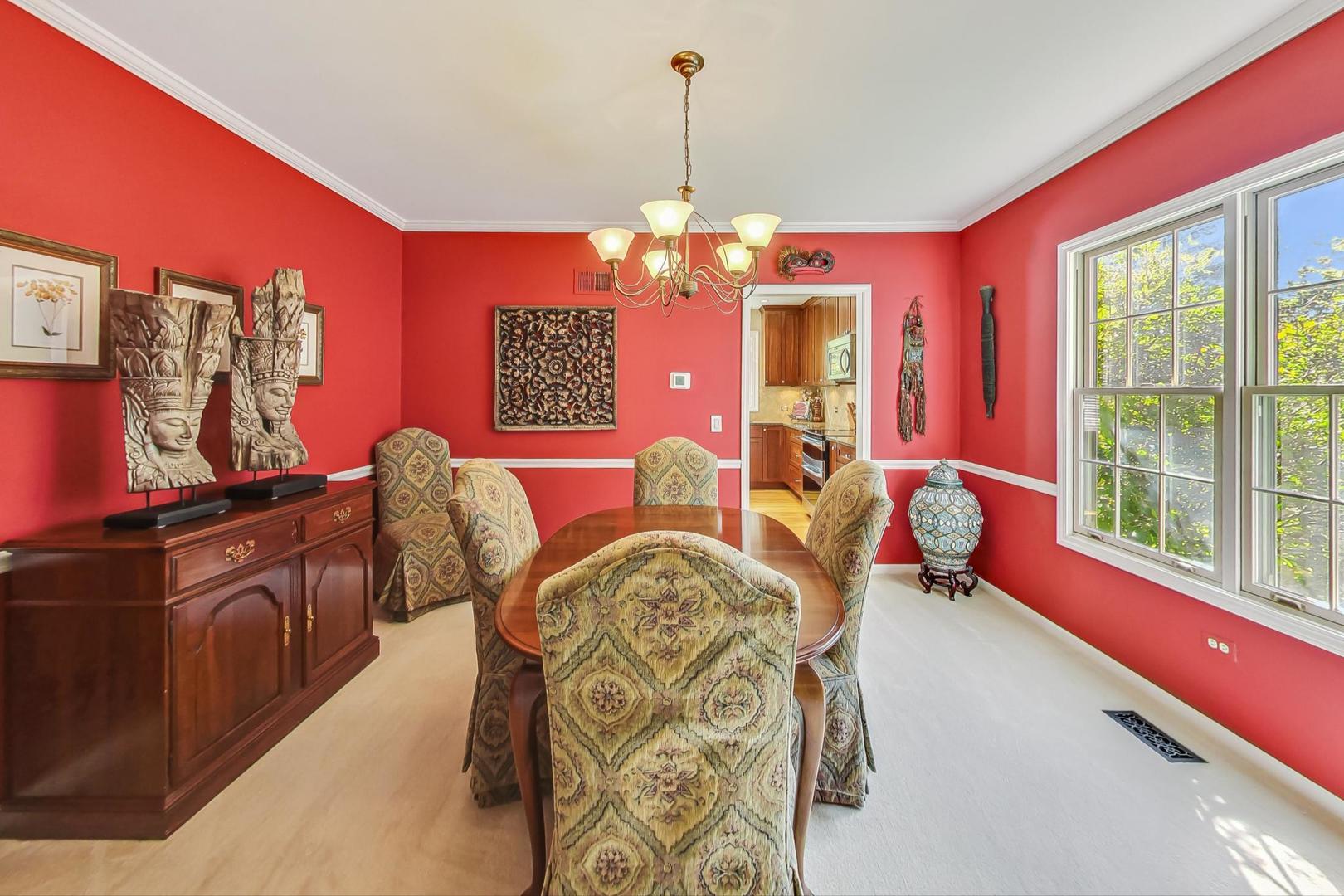 4763 Middle Road Gurnee, IL 60031 - Photo 6 of 47 a view of a dining room with furniture and chandelier