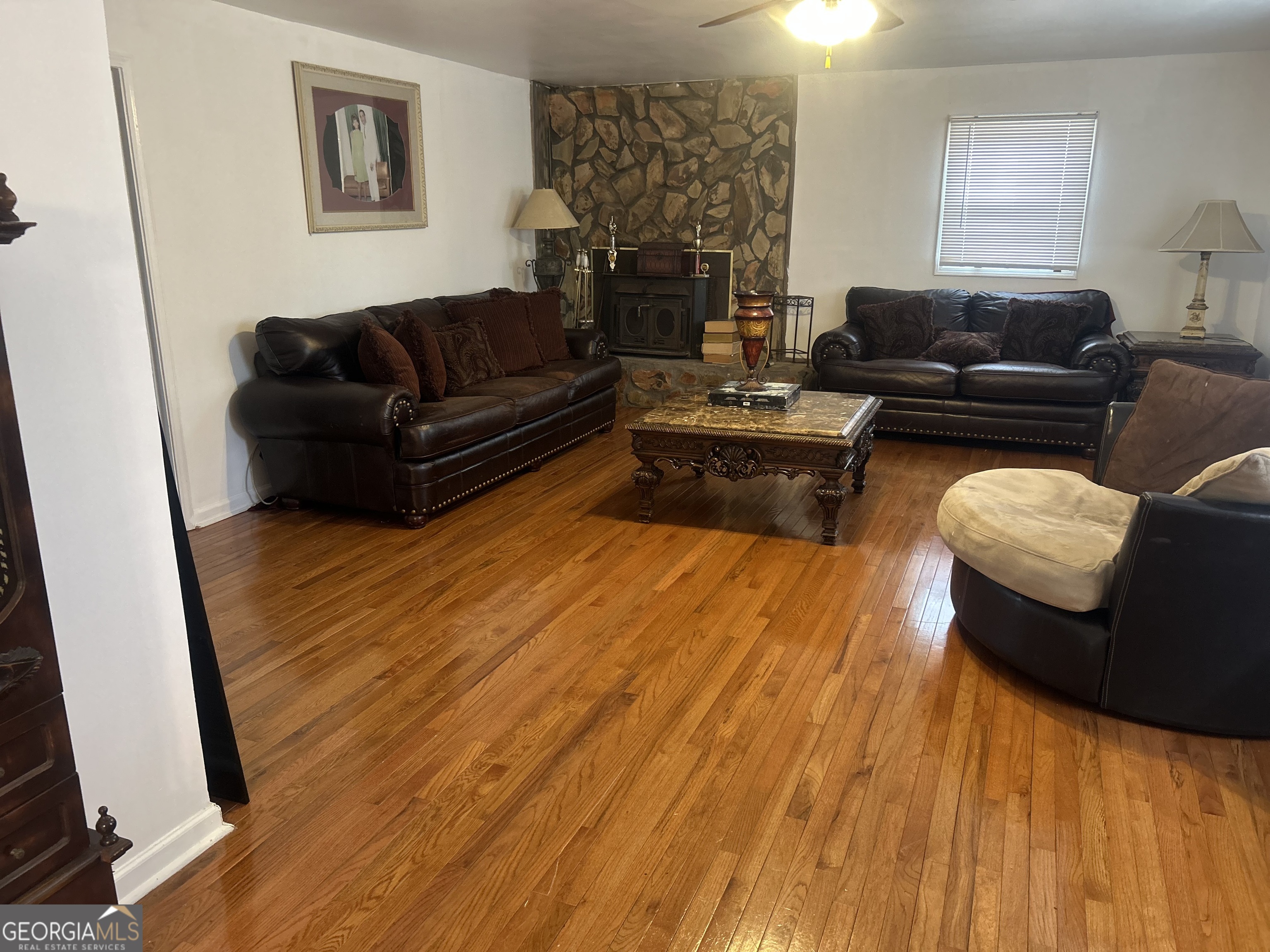 1406 Canterbury Road Griffin, GA 30223 - Photo 14 of 26 a living room with furniture and a couch