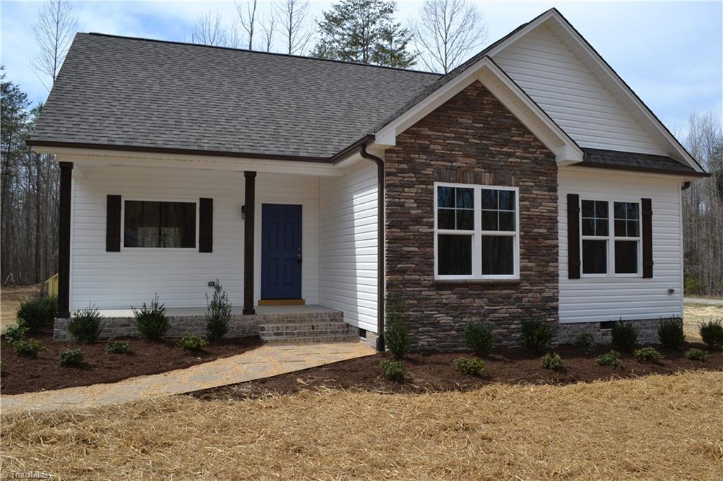 486 Price Farm Road Stokesdale, NC 27357 - Photo 1 of 15 Front of House