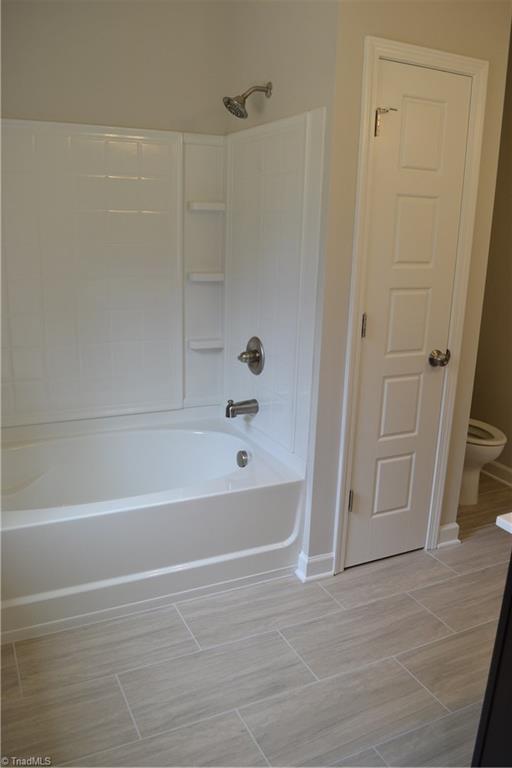 486 Price Farm Road Stokesdale, NC 27357 - Photo 11 of 15 Tub/Shower and Linen Closet in Master Bath