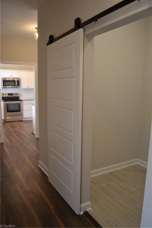 486 Price Farm Road Stokesdale, NC 27357 - Photo 13 of 15 Barn Door entry to Laundry