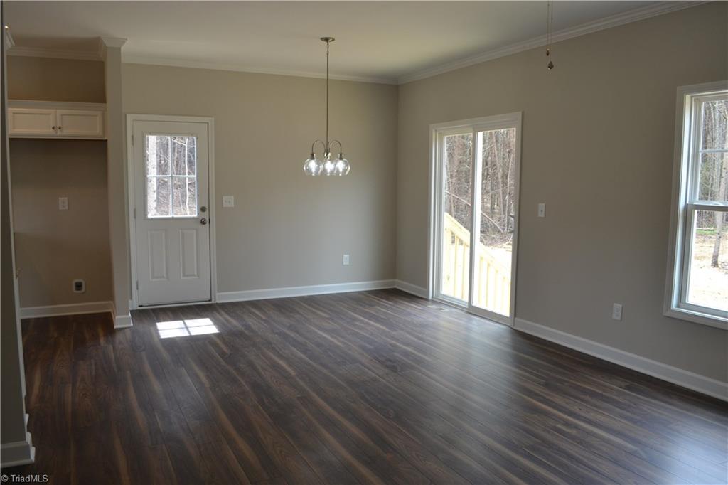 486 Price Farm Road Stokesdale, NC 27357 - Photo 7 of 15 View of Dining Area from Living Room