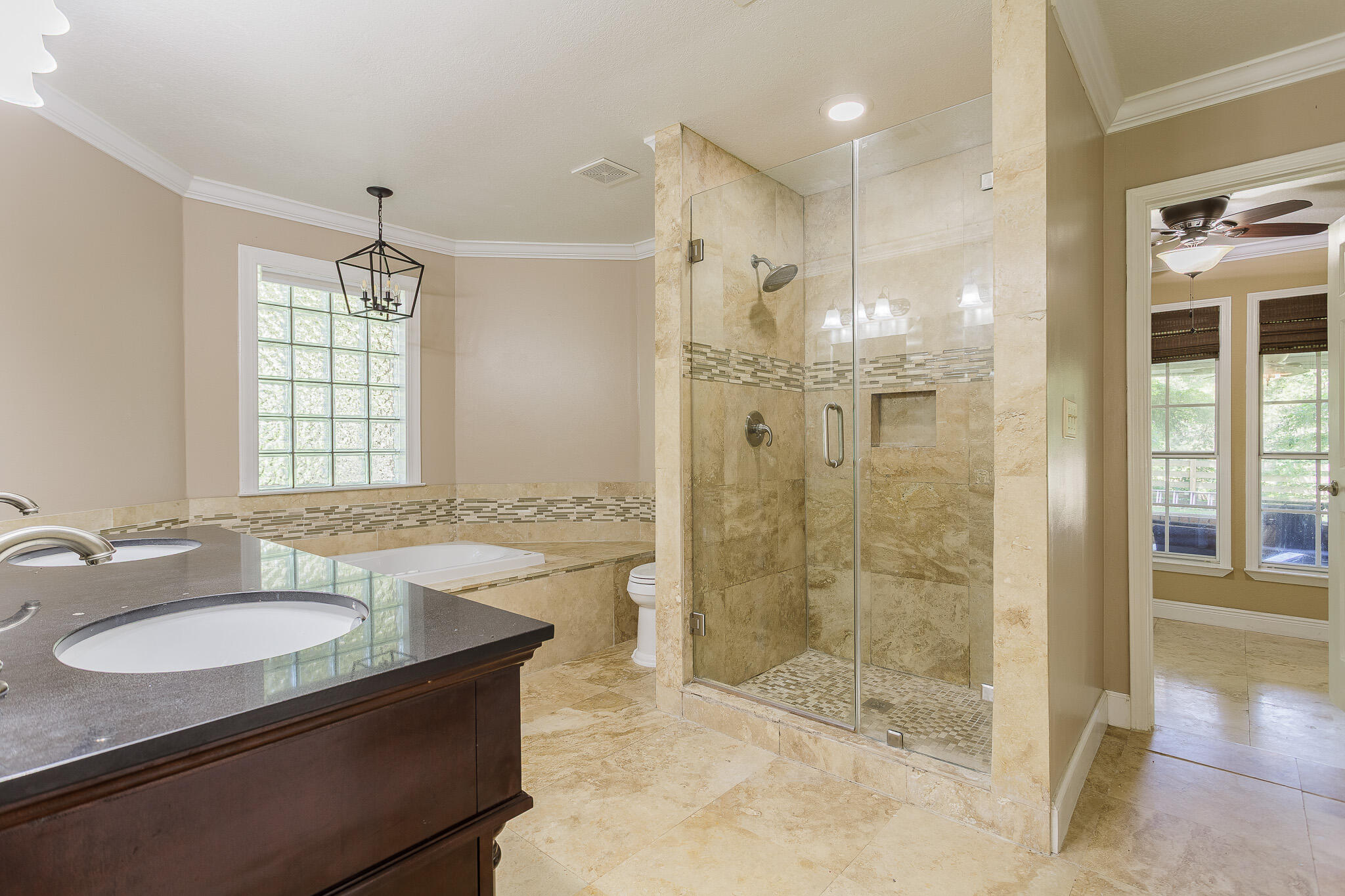 329 Skyline Circle Crestview, FL 32539 - Photo 13 of 28 a bathroom with a granite countertop shower sink and mirror