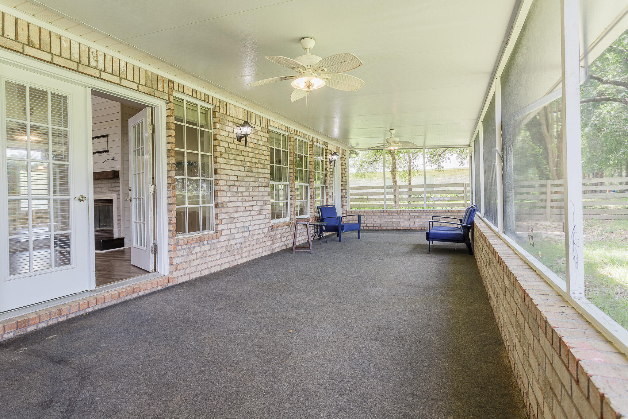 329 Skyline Circle Crestview, FL 32539 - Photo 24 of 28 a living room with furniture and a large window