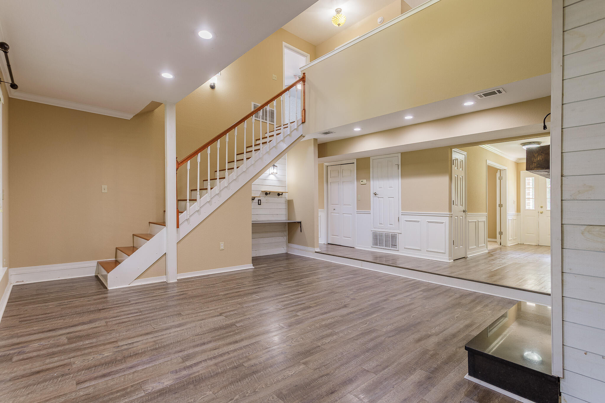 329 Skyline Circle Crestview, FL 32539 - Photo 9 of 28 a view of an entryway with wooden floor