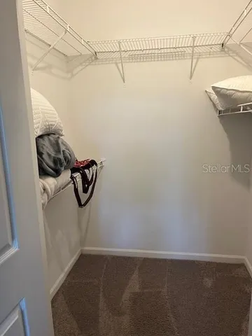 a view of a room with racks on the wall