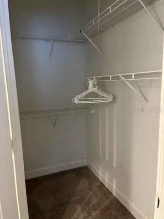 a view of a room with racks on the wall