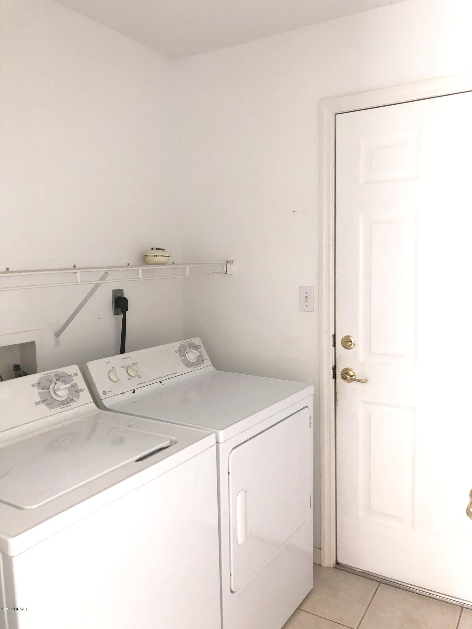 2813 Unity Tree Drive Edgewater, FL 32141 - Photo 11 of 15 laundry room