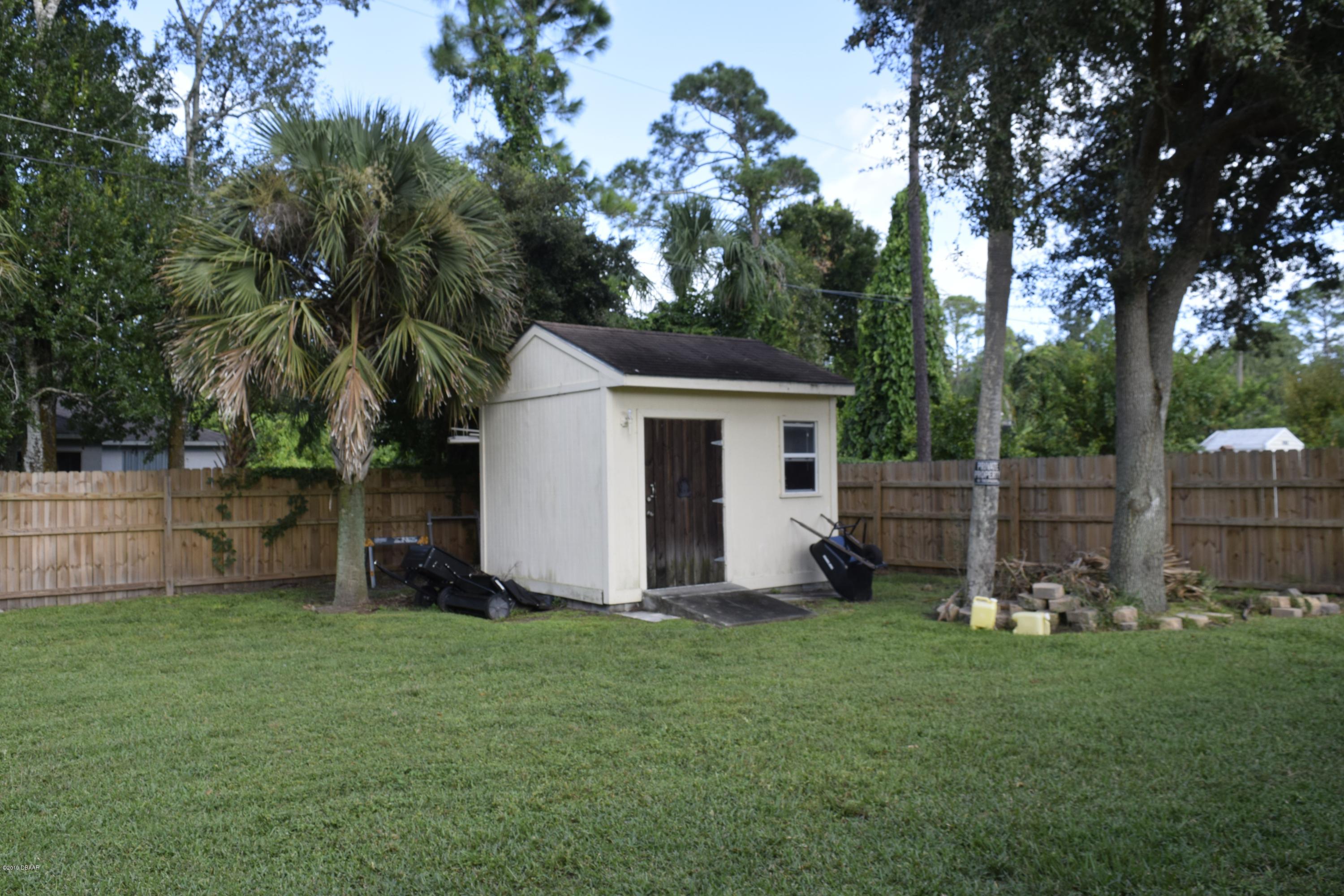 2813 Unity Tree Drive Edgewater, FL 32141 - Photo 14 of 15 Work Shop