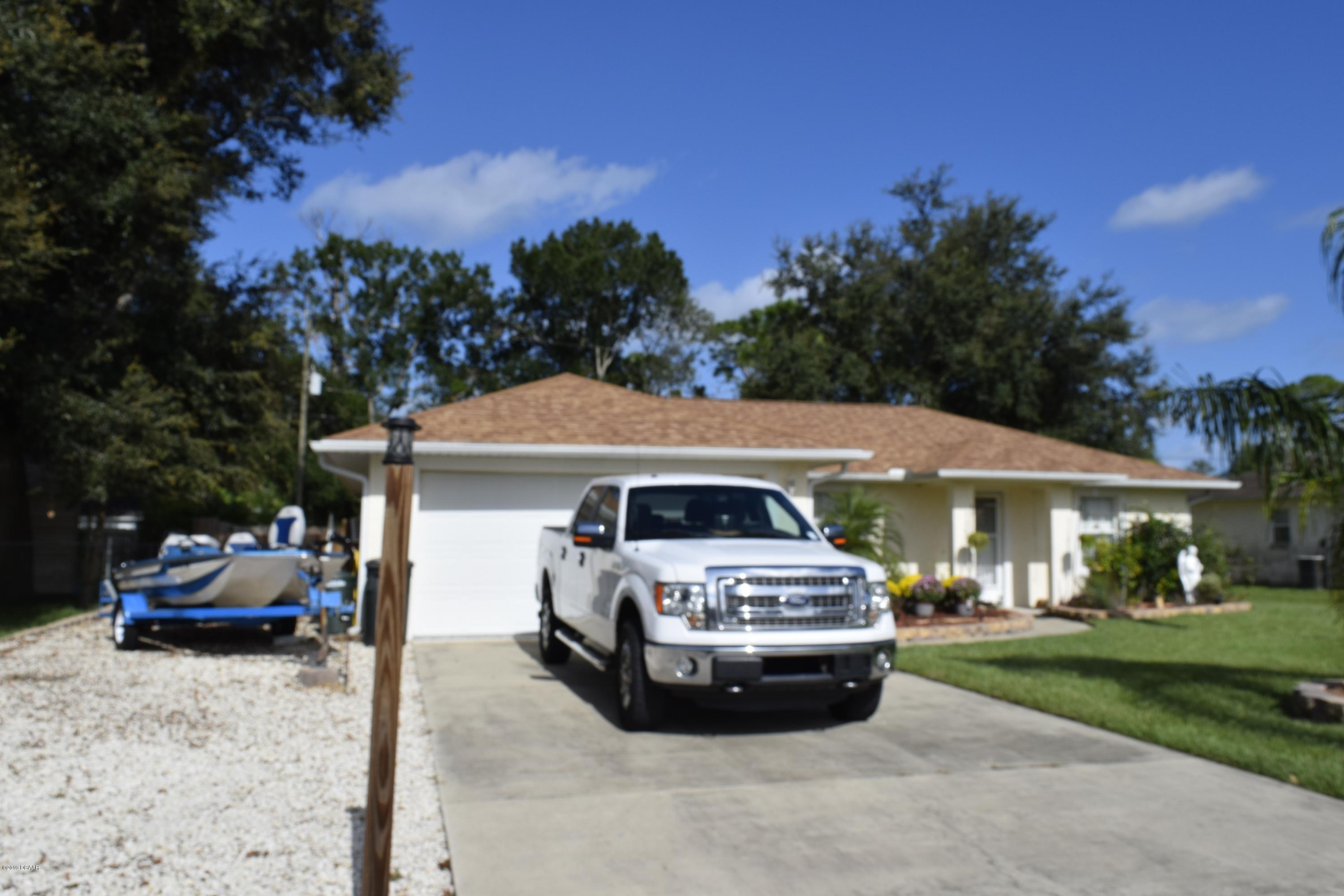 2813 Unity Tree Drive Edgewater, FL 32141 - Photo 2 of 15 Front of driveway