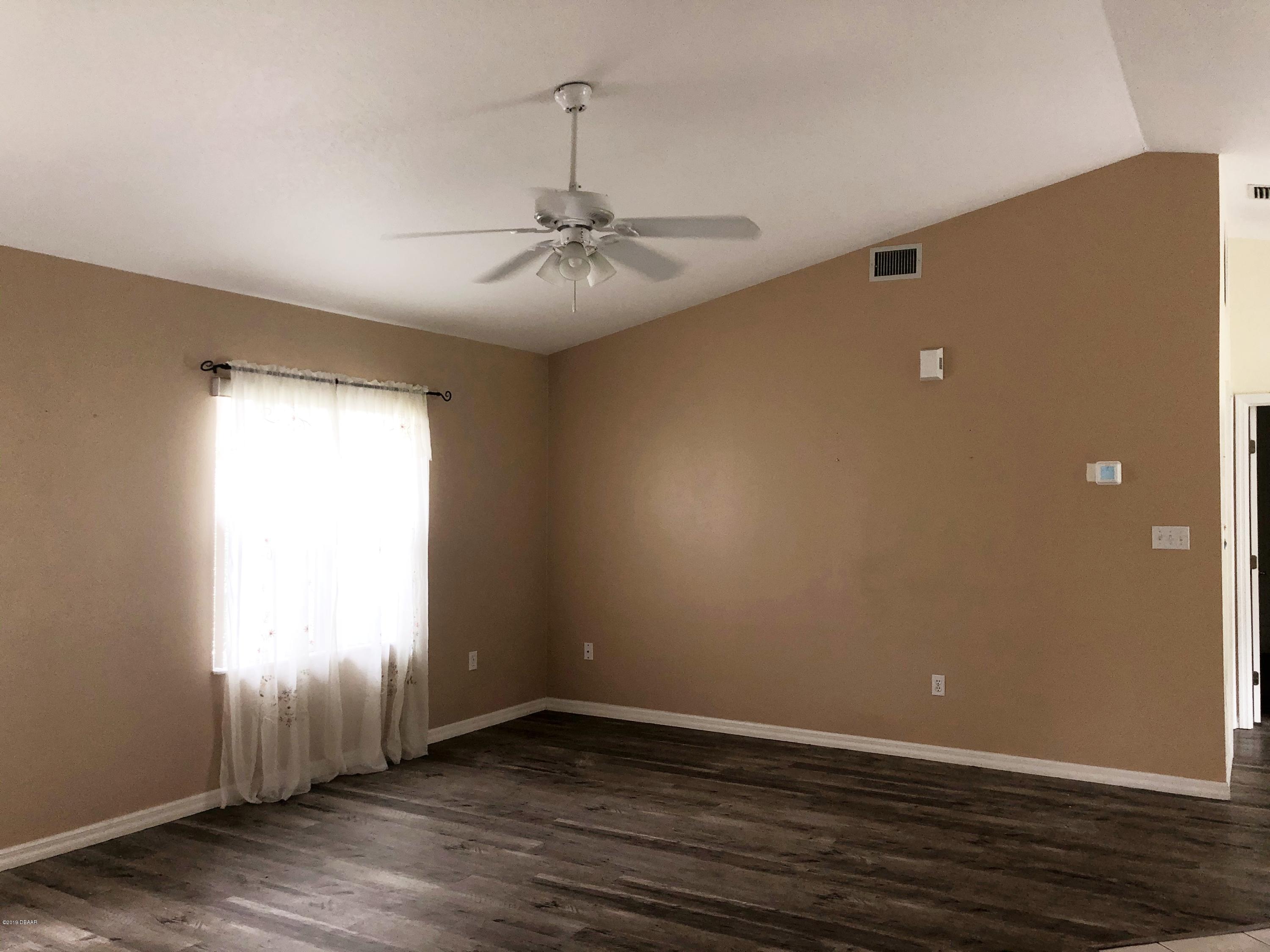 2813 Unity Tree Drive Edgewater, FL 32141 - Photo 3 of 15 Living room