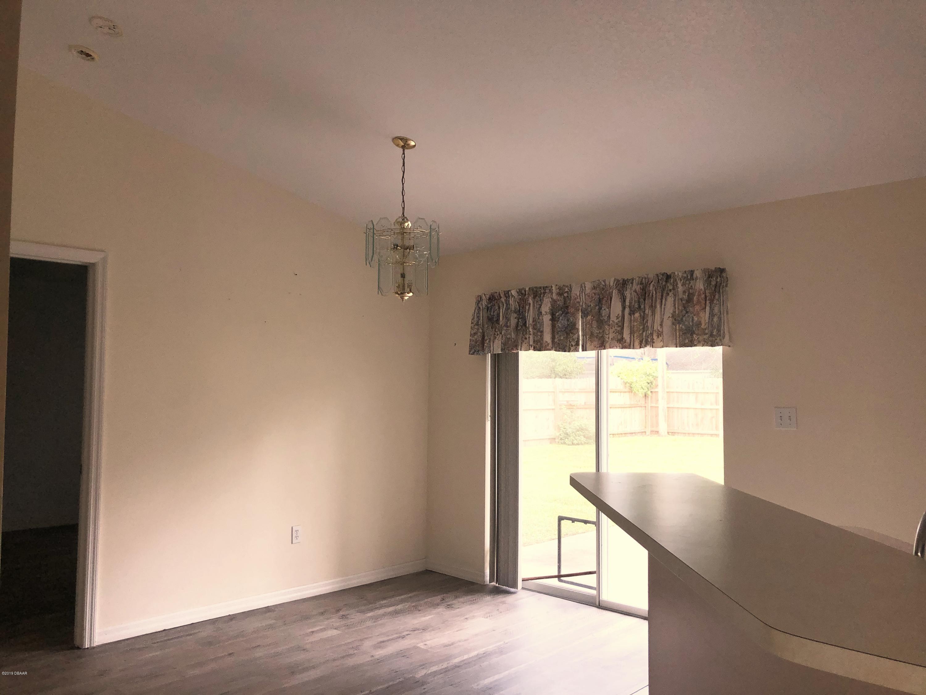 2813 Unity Tree Drive Edgewater, FL 32141 - Photo 5 of 15 Dining Room
