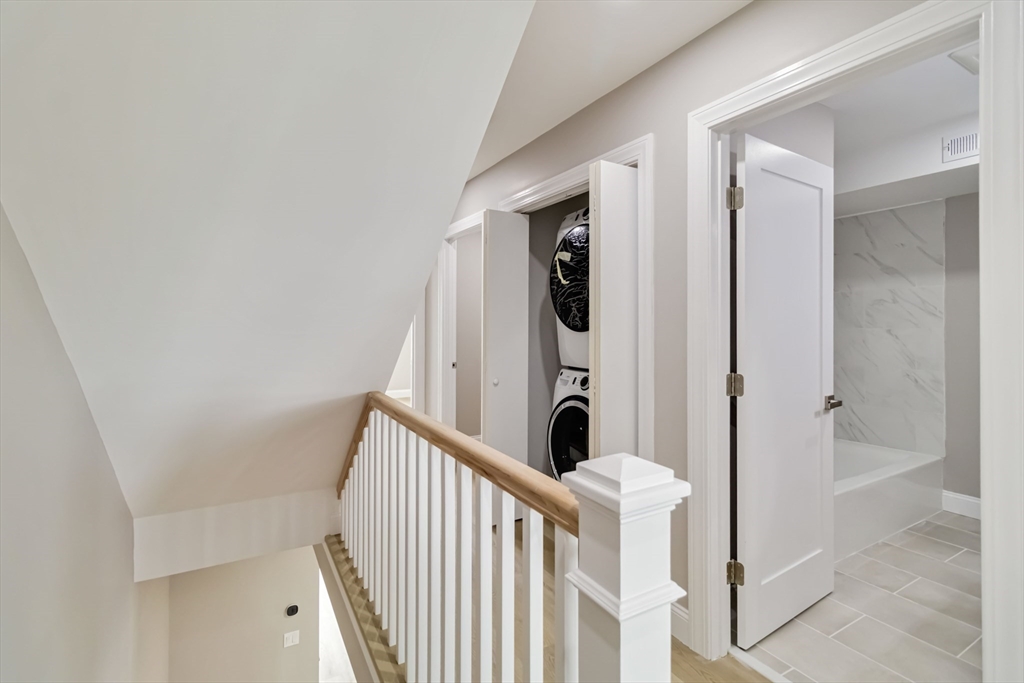 192 Main Street, Unit D Medway, MA 02053 - Photo 20 of 39 a view of a hallway with washer and dryer