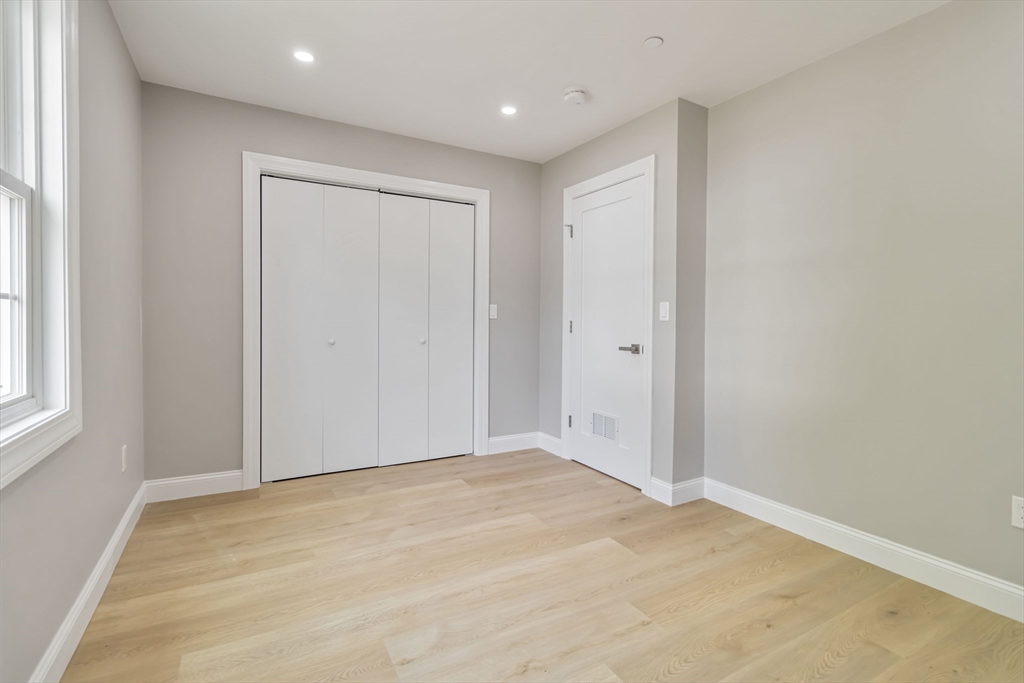 192 Main Street, Unit D Medway, MA 02053 - Photo 23 of 39 an empty room with window