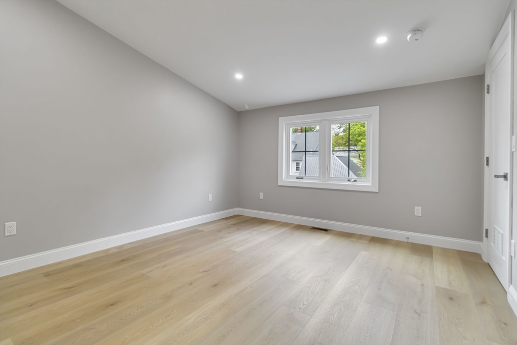 192 Main Street, Unit D Medway, MA 02053 - Photo 31 of 39 an empty room with windows