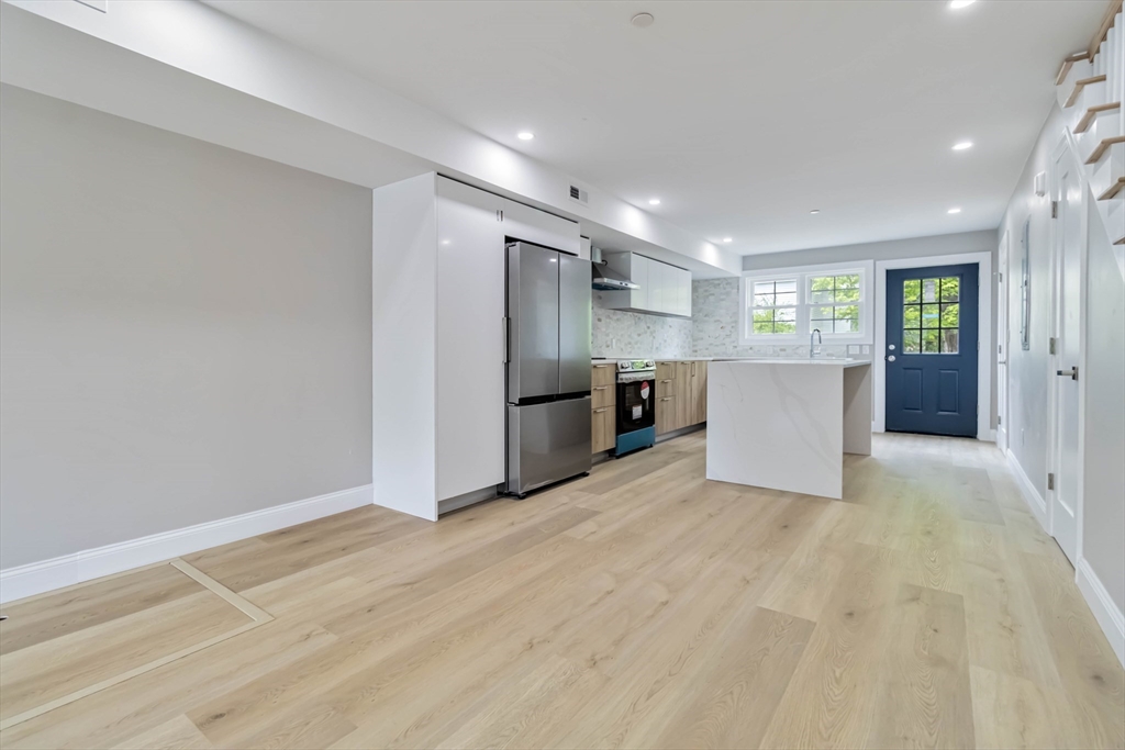 192 Main Street, Unit D Medway, MA 02053 - Photo 9 of 39 a view of kitchen with refrigerator stove microwave and refrigerator