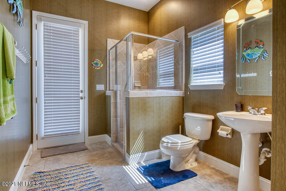 11590 Mandarin Road Jacksonville, FL 32223 - Photo 29 of 46 a bathroom with a toilet and a sink