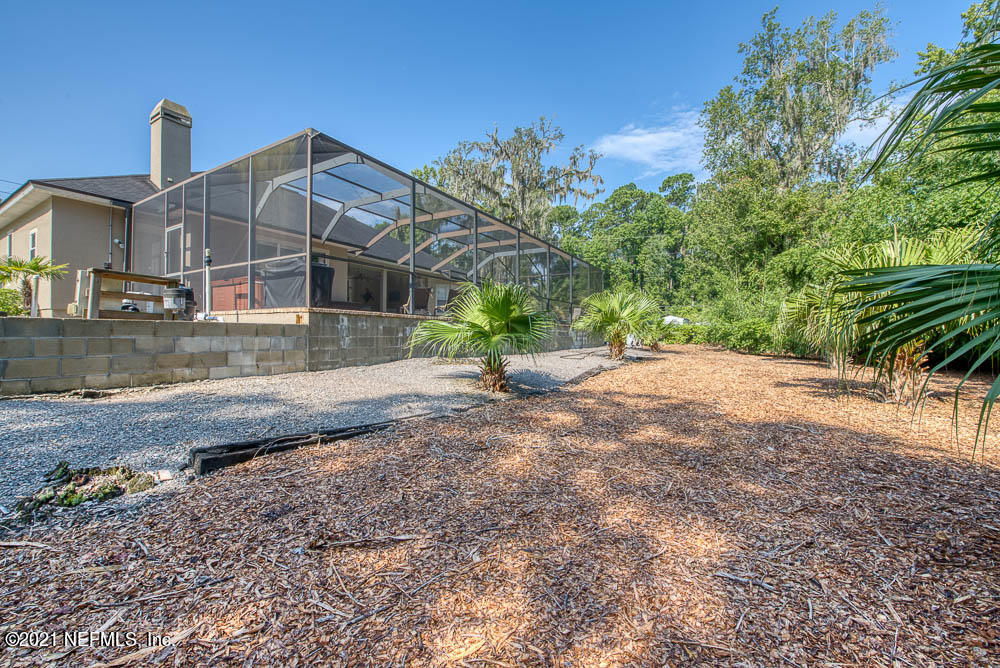 11590 Mandarin Road Jacksonville, FL 32223 - Photo 39 of 46 a view of a house with a yard