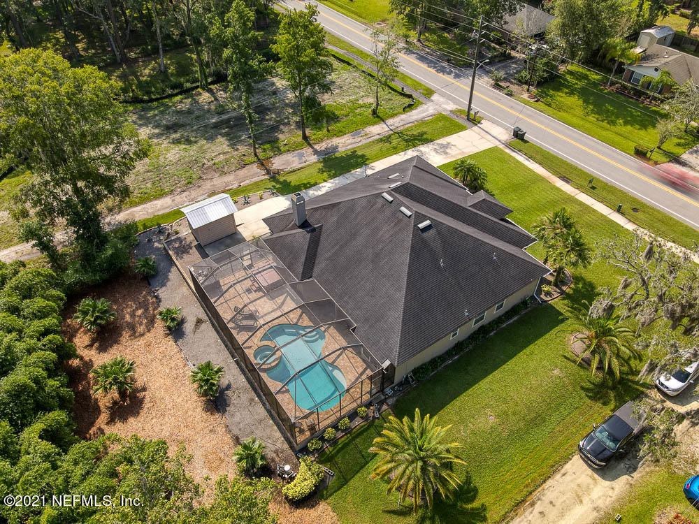 11590 Mandarin Road Jacksonville, FL 32223 - Photo 42 of 46 a view of swimming pool with a yard