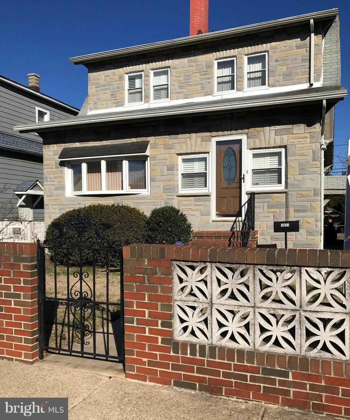 1831 Portship Road Baltimore, MD 21222 - Photo 1 of 17 a front view of a house with a yard