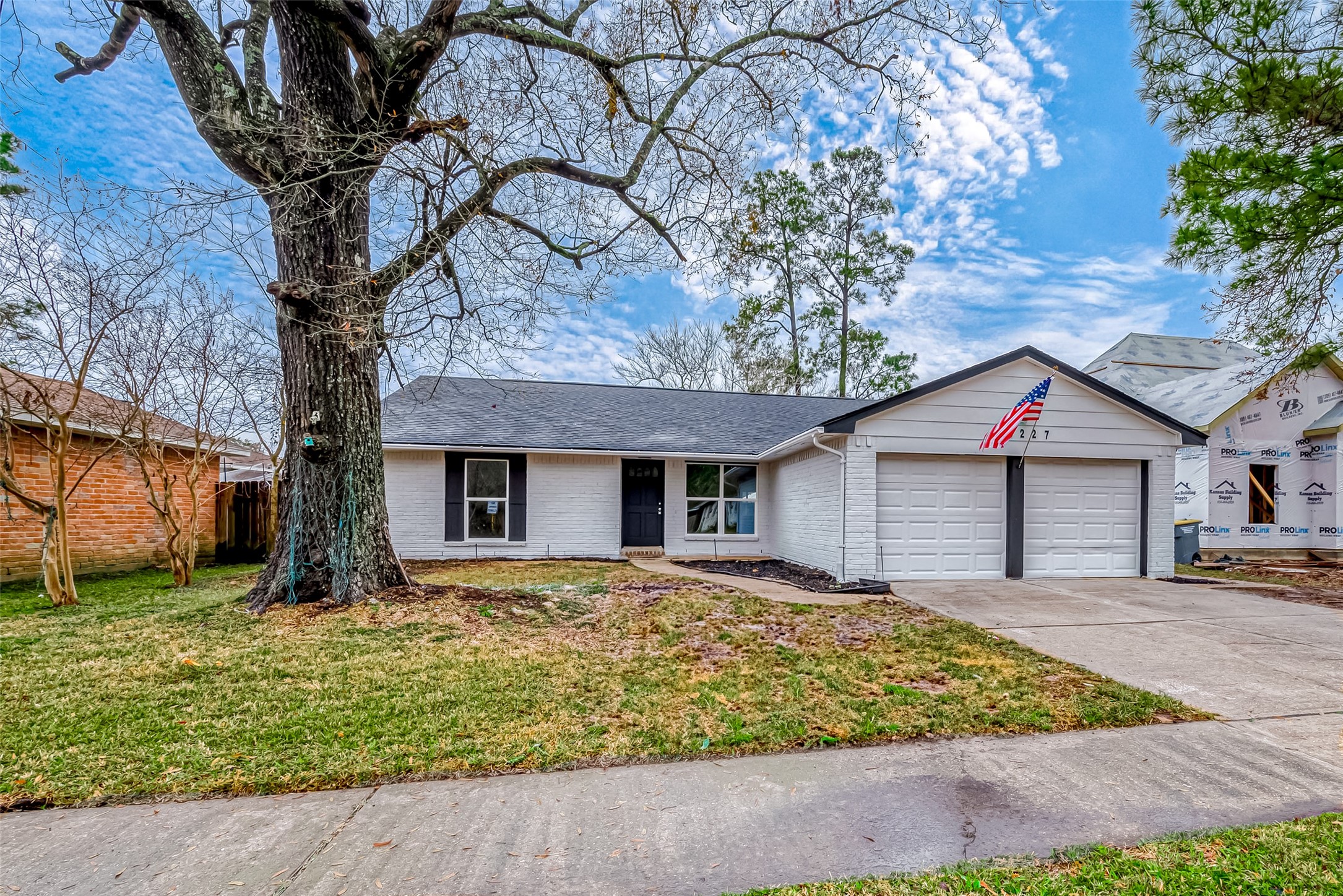 a house with trees in the background