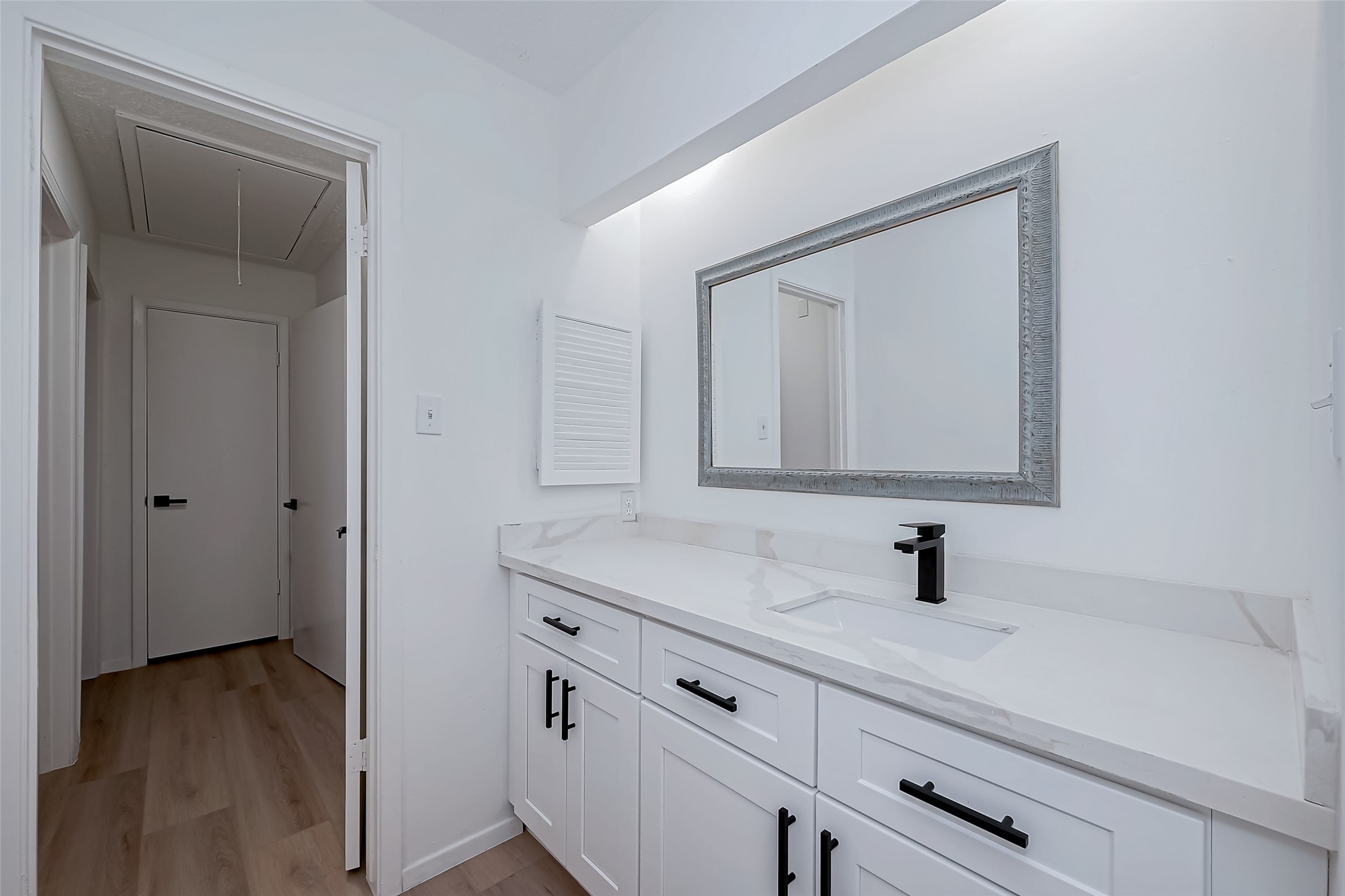 23227 Pine Post Lane Spring, TX 77373 - Photo 21 of 40 a bathroom with a sink and a mirror