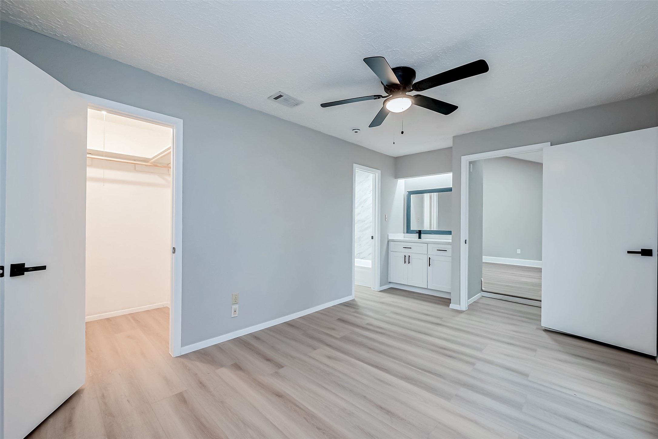 23227 Pine Post Lane Spring, TX 77373 - Photo 23 of 40 a view of empty room with wooden floor and ceiling fan