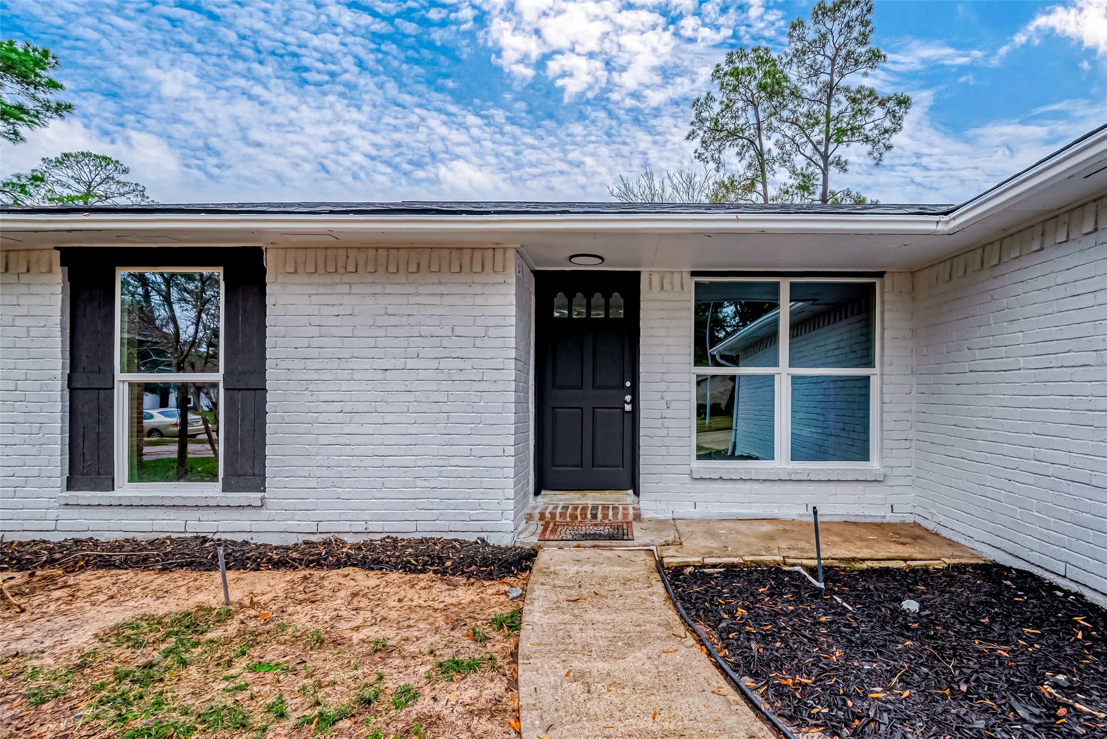 23227 Pine Post Lane Spring, TX 77373 - Photo 3 of 40 a front view of a house with a large window