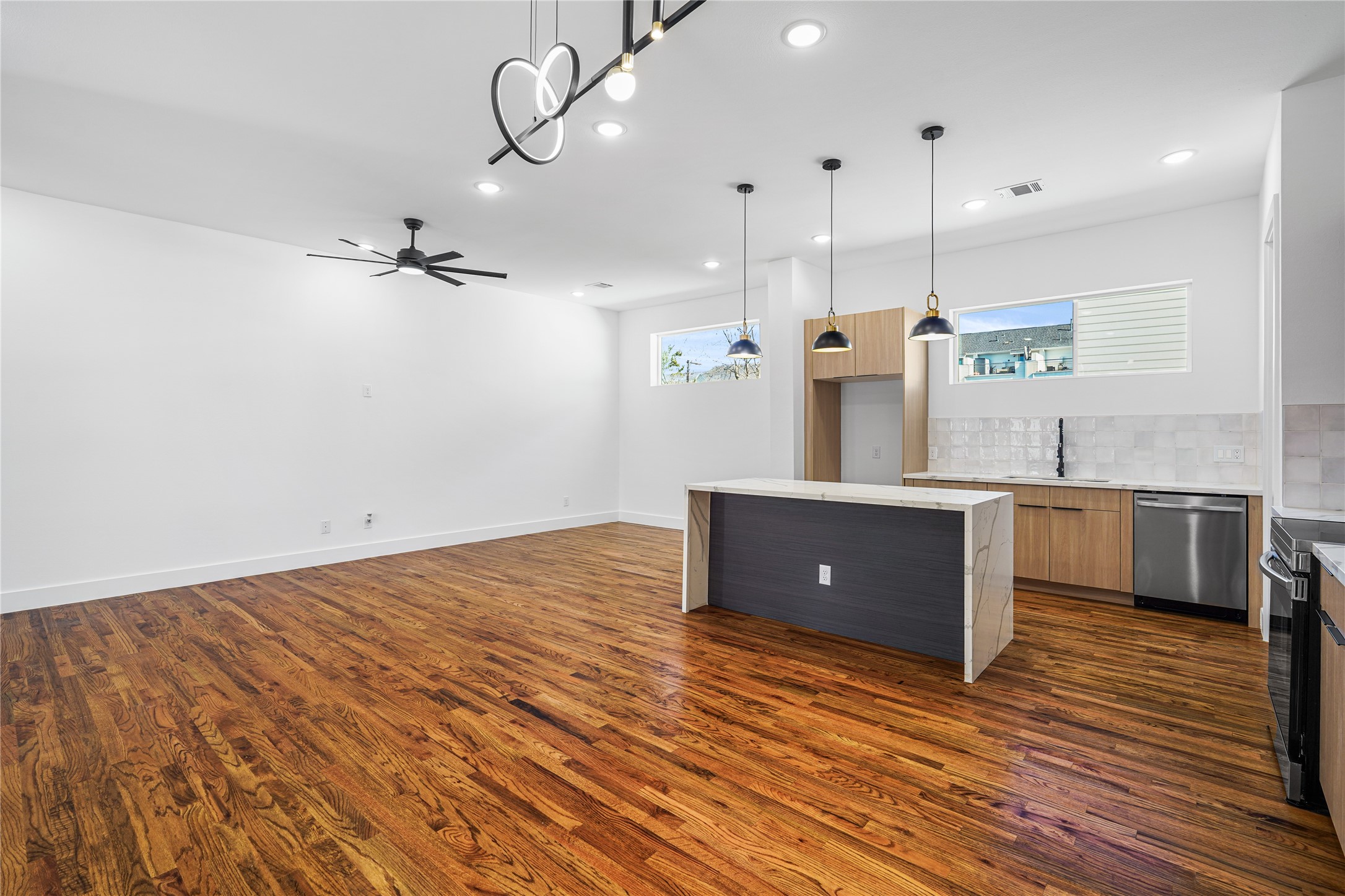 3405 Baer Street Houston, TX 77020 - Photo 11 of 28 a view of a kitchen with a sink and wooden floor