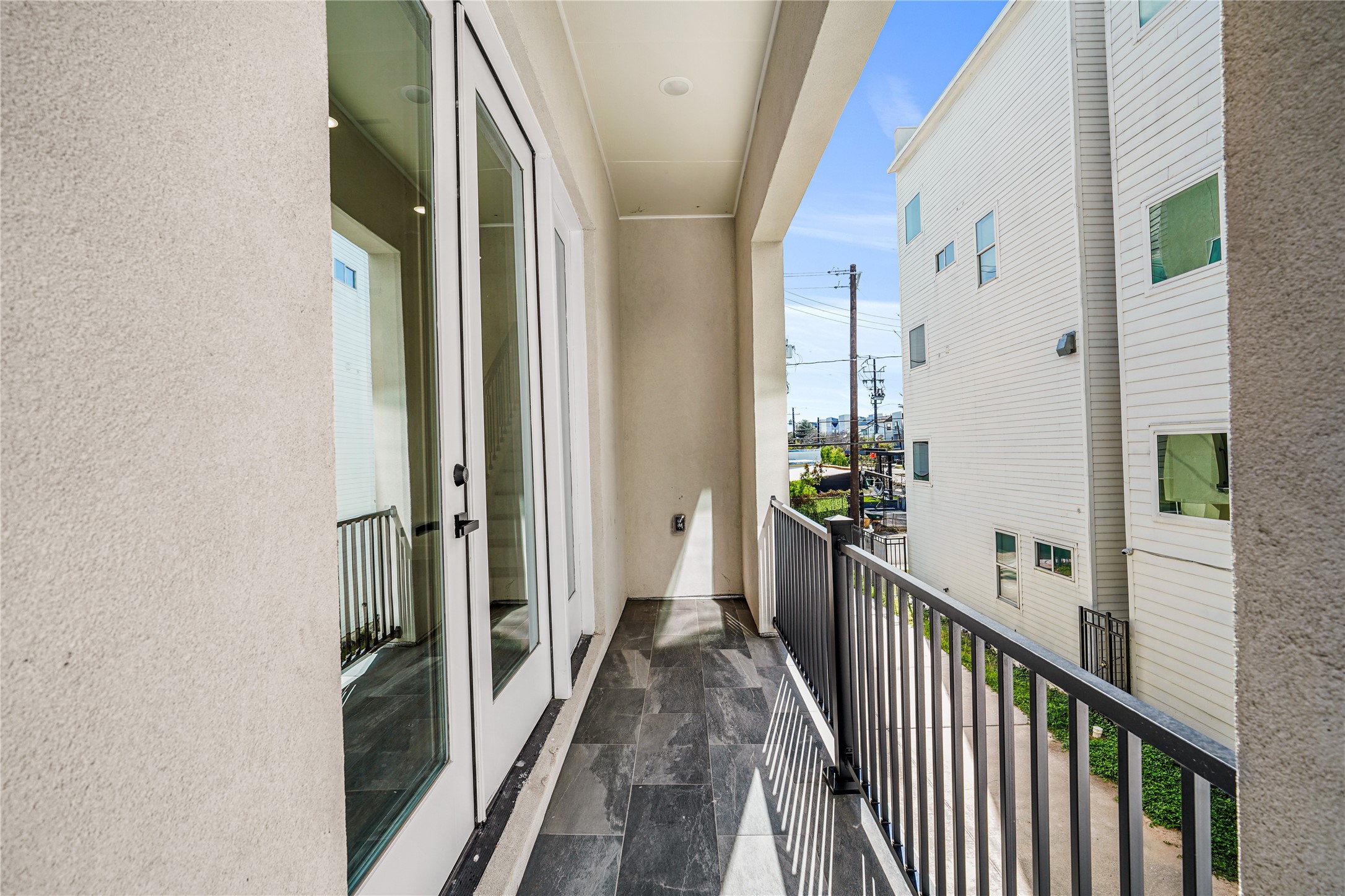 3405 Baer Street Houston, TX 77020 - Photo 13 of 28 a view of a hallway with wooden floor and staircase