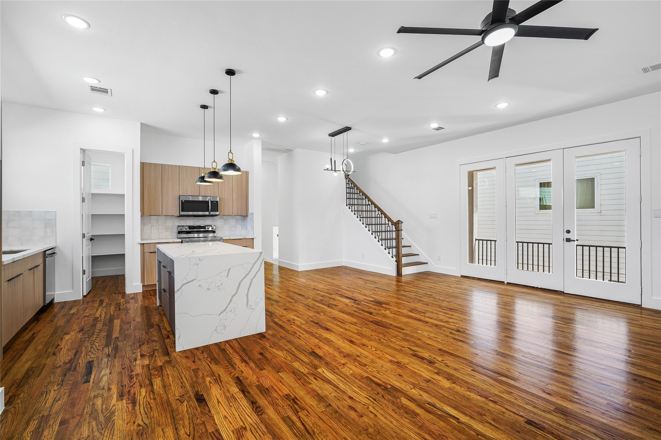 3405 Baer Street Houston, TX 77020 - Photo 7 of 28 a view of kitchen with furniture and wooden floor