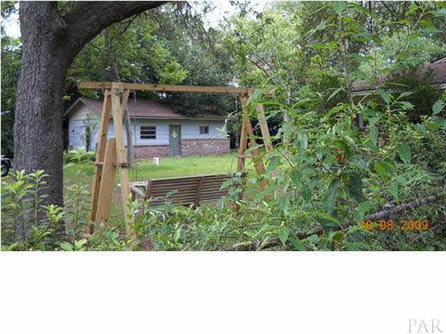 4664 Cerny Road Pensacola, FL 32526 - Photo 6 of 22 from front looking to back yard, detached garage/shop